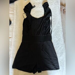 Black jumpsuit 
Size s